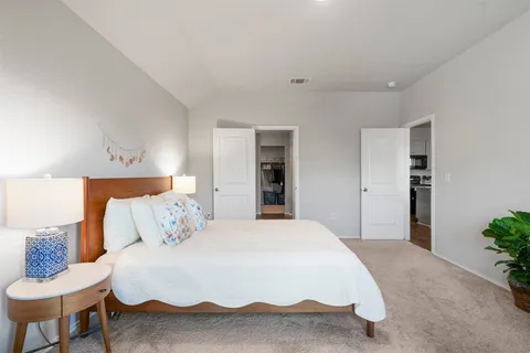 a bathroom with a double vanity sink and mirror