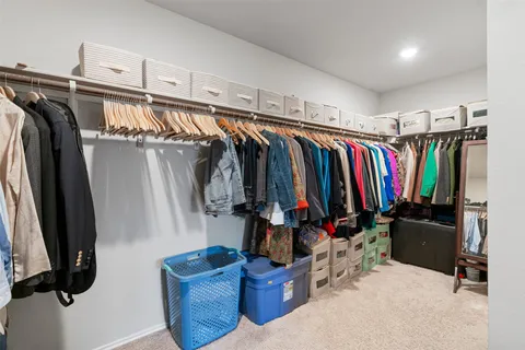 a living room with furniture and windows