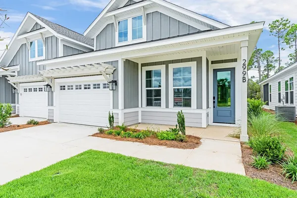 front view of a house with a yard