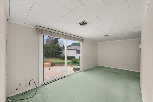 an empty room with a bathroom