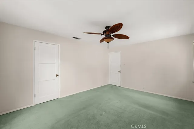 a bathroom with a sink a mirror and a shower