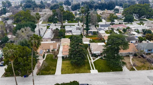 an aerial view of residential house with outdoor space