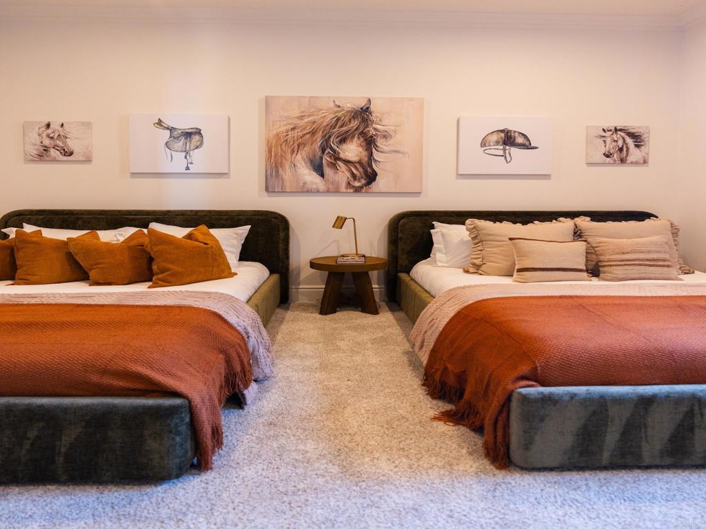 18000 Sunset Point Road Poway, CA 92064 - Photo 12 of 20 a bed room with two bed and painting on the wall