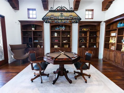 a view of a livingroom with workspace and a couch