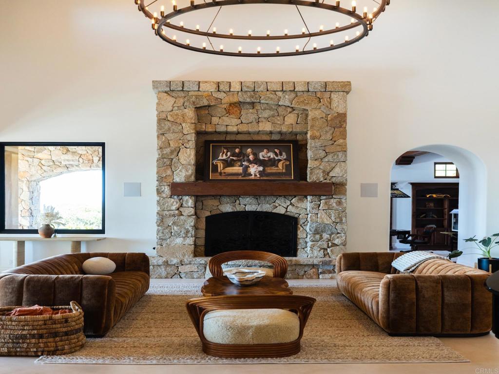 18000 Sunset Point Road Poway, CA 92064 - Photo 4 of 19 a living room with furniture and a fireplace