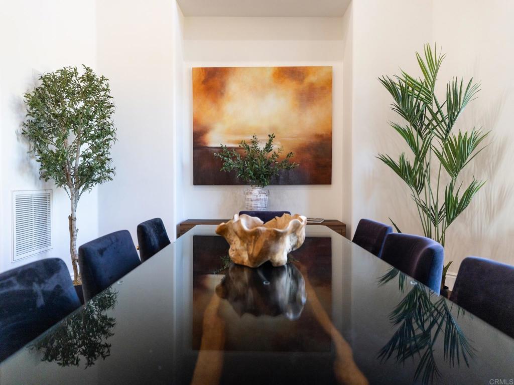 18000 Sunset Point Road Poway, CA 92064 - Photo 9 of 20 a living room with furniture and a potted plant