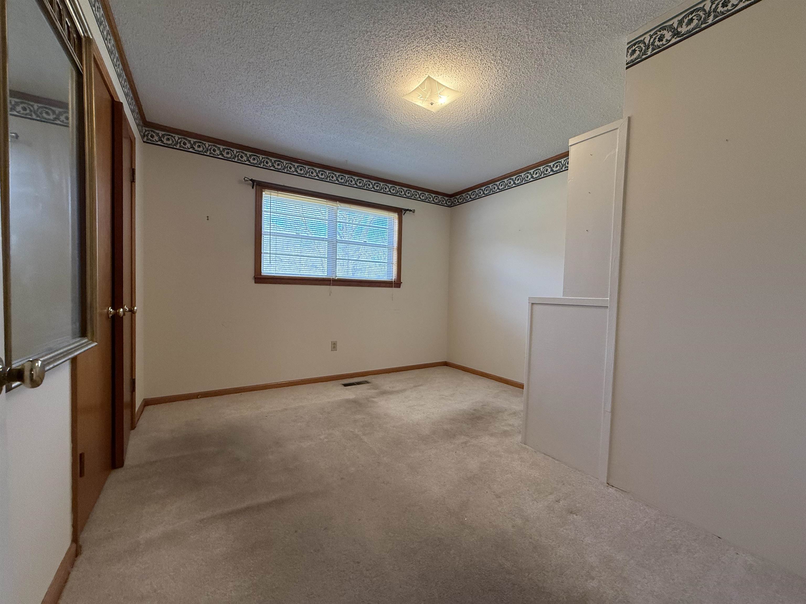 115 Robertson Drive Somerville, TN 38068 - Photo 16 of 19 a view of an empty room