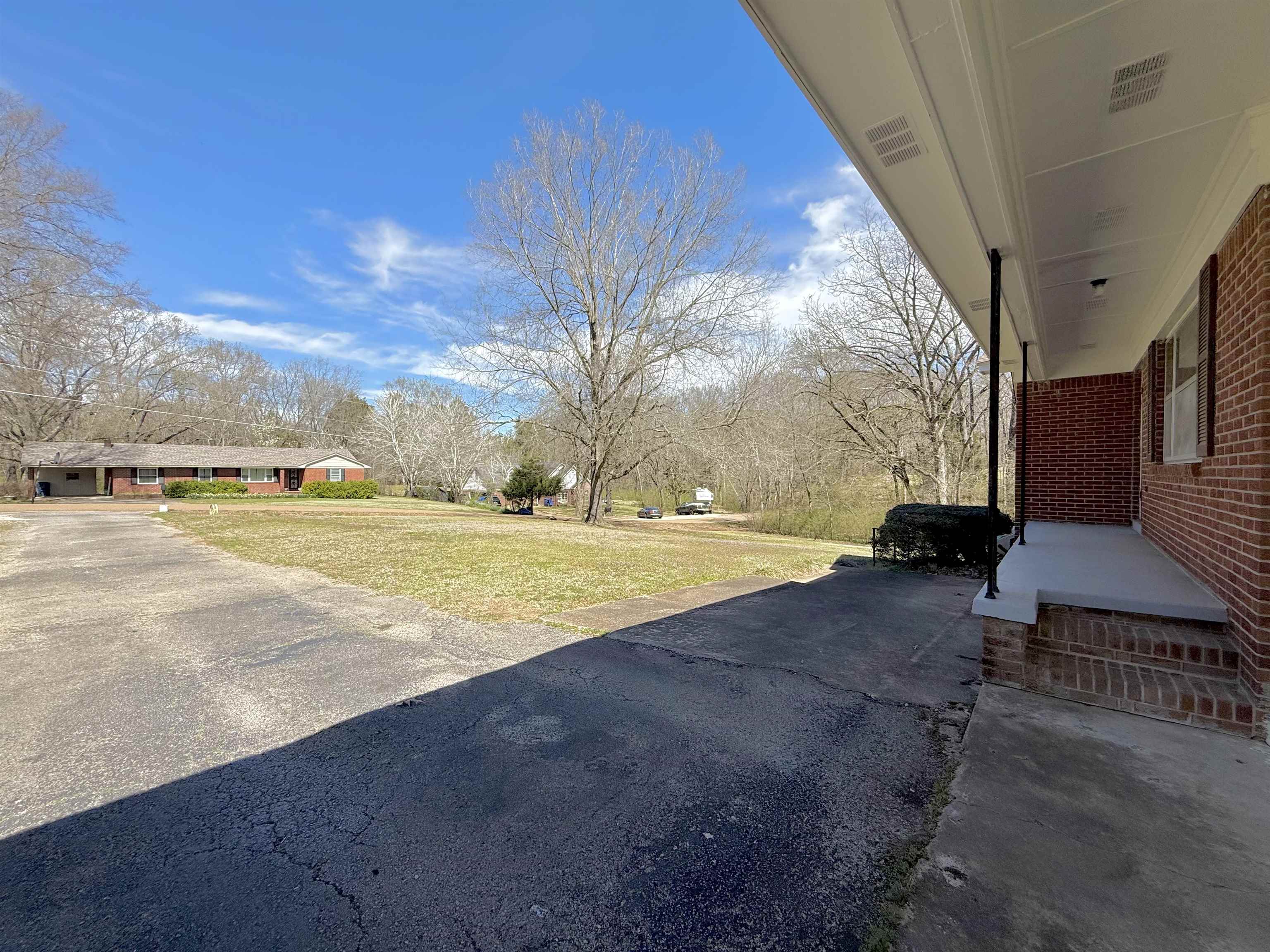 115 Robertson Drive Somerville, TN 38068 - Photo 2 of 19 a view of yard with swimming pool and seating
