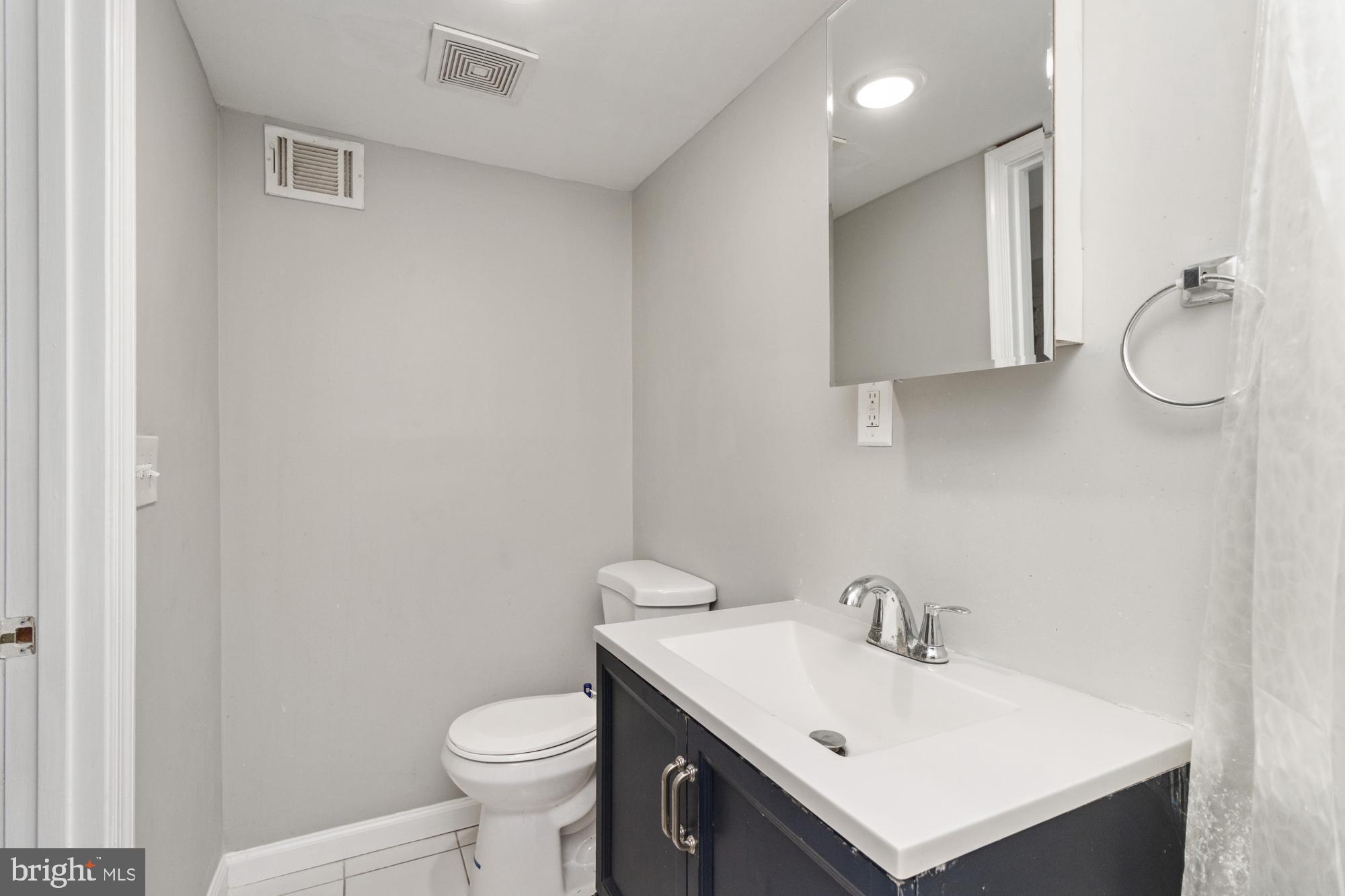 539 South Longwood Street Baltimore, MD 21223 - Photo 18 of 26 Basement bathroom