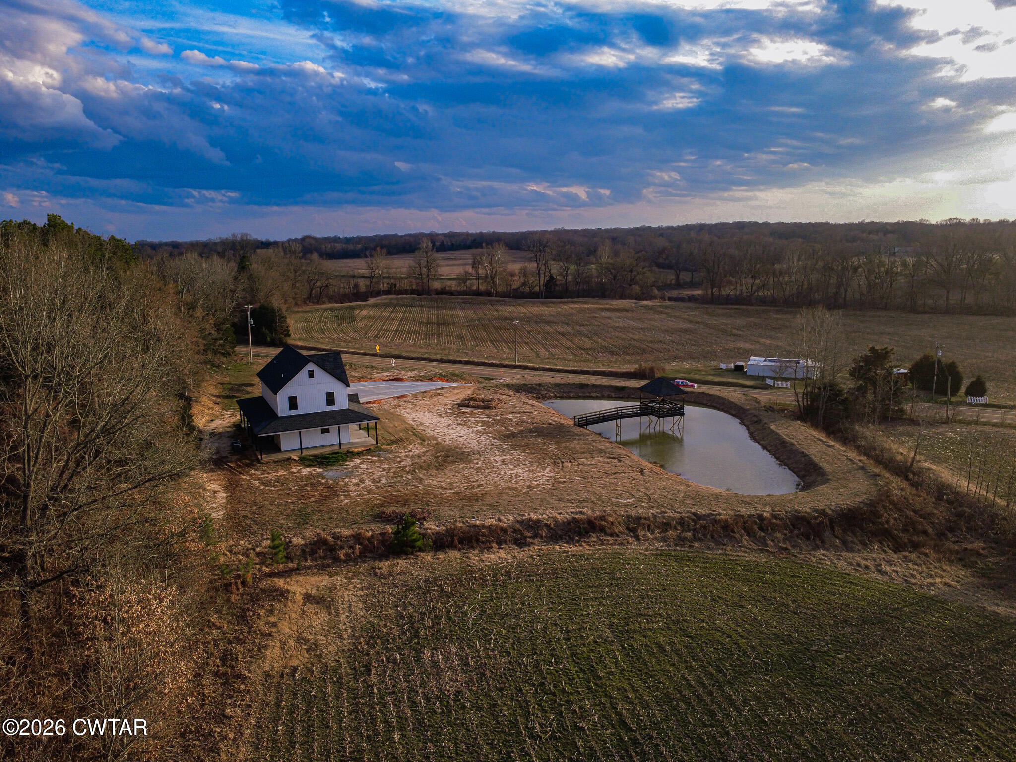 6523 Alamo Gadsden Road Gadsden, TN 38337 - Photo 21 of 25 a view of a lake with a car parked
