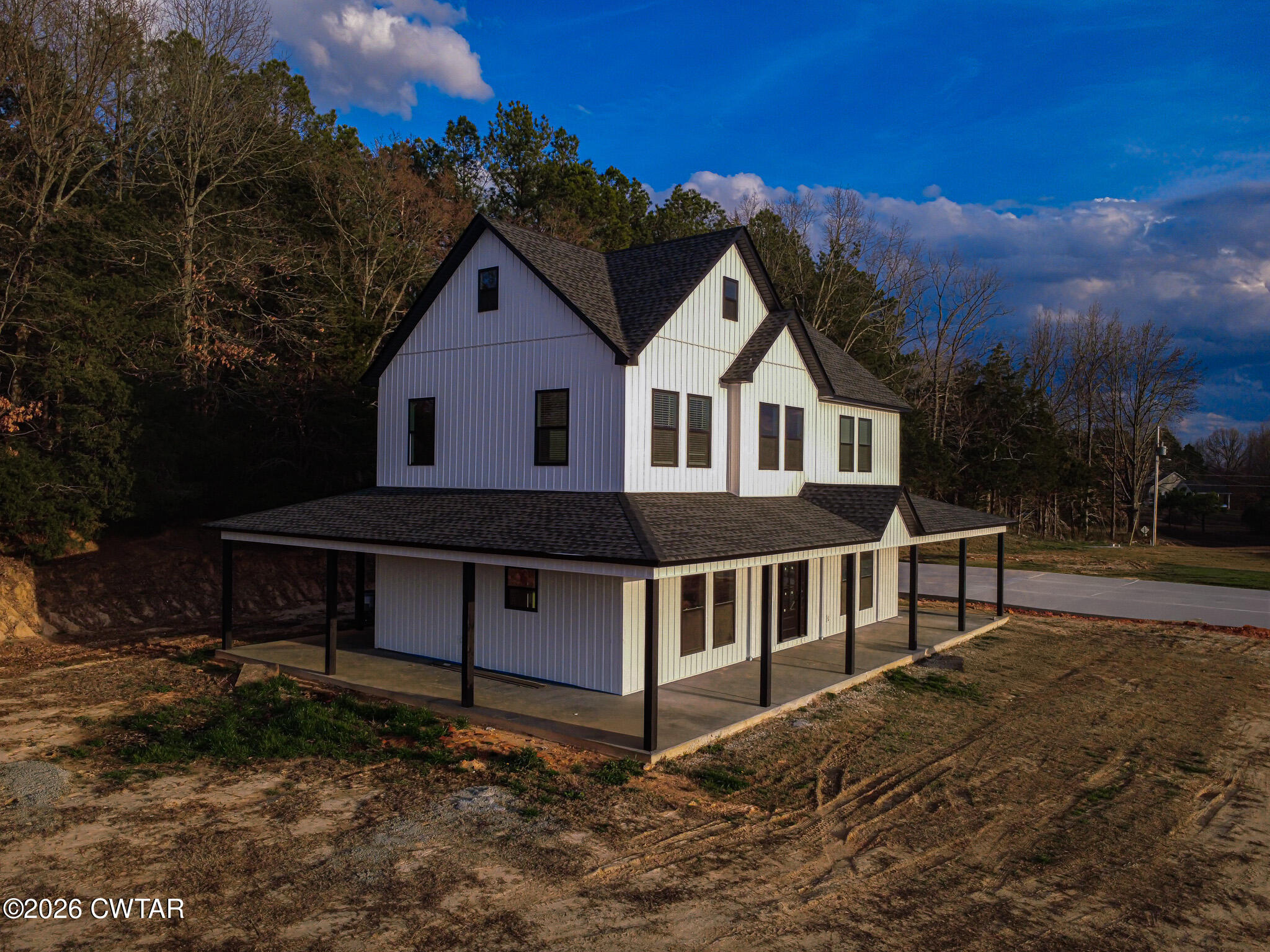 6523 Alamo Gadsden Road Gadsden, TN 38337 - Photo 3 of 25 a view of a house with a yard and a yard