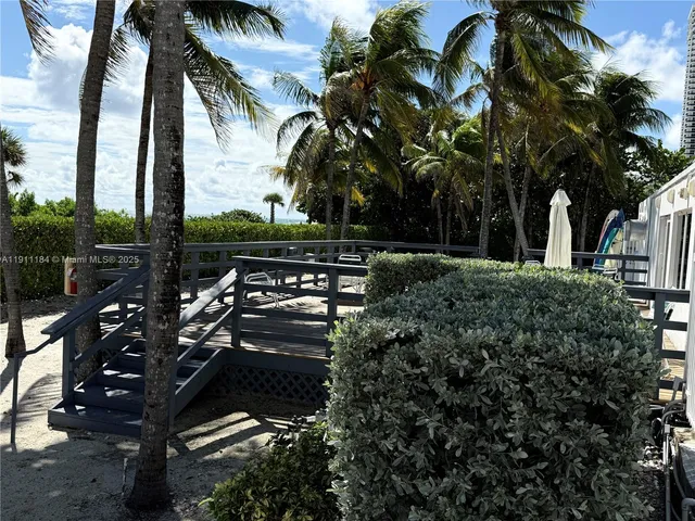 a view of swimming pool with a yard
