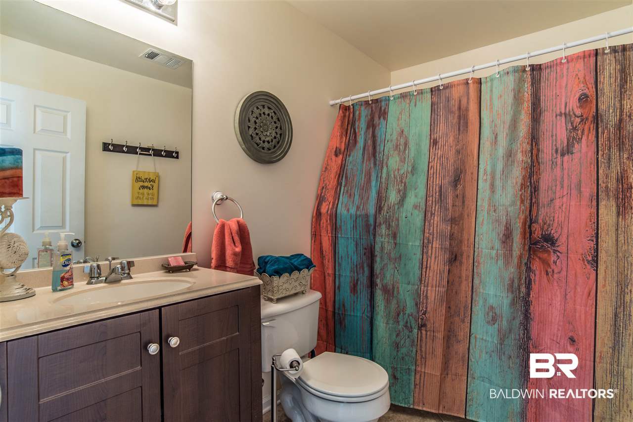 1517 Regency Road, Unit 14 Gulf Shores, AL 36542 - Photo 12 of 25 Utility Room/Half Bath