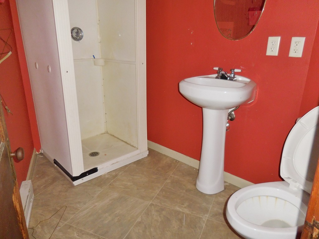 19 Russell Road Huntington, MA 01050 - Photo 17 of 21 a bathroom with a sink toilet and shower