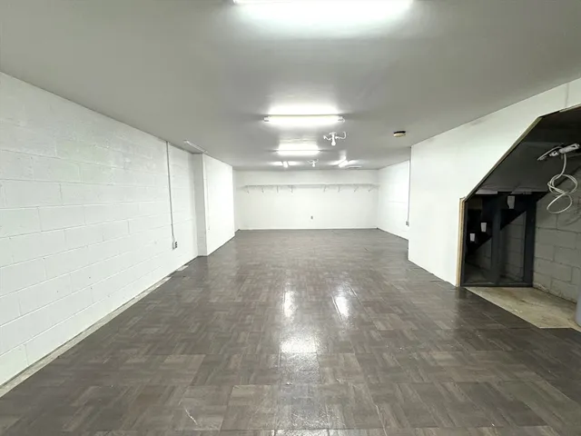 a view of a hallway with an empty room
