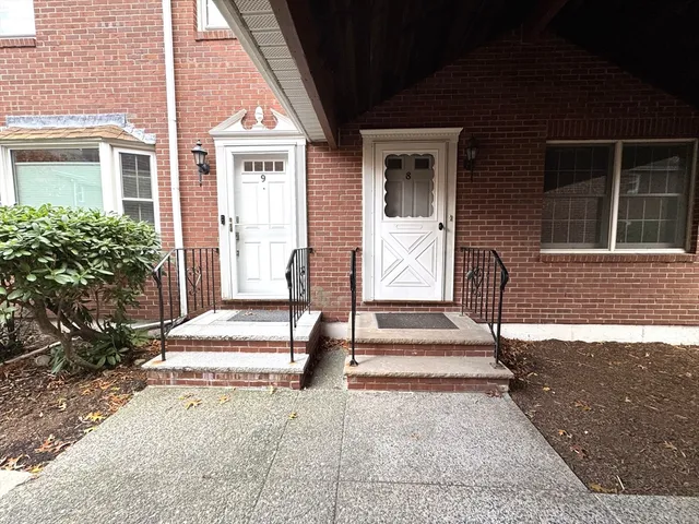 a front view of a house with a porch