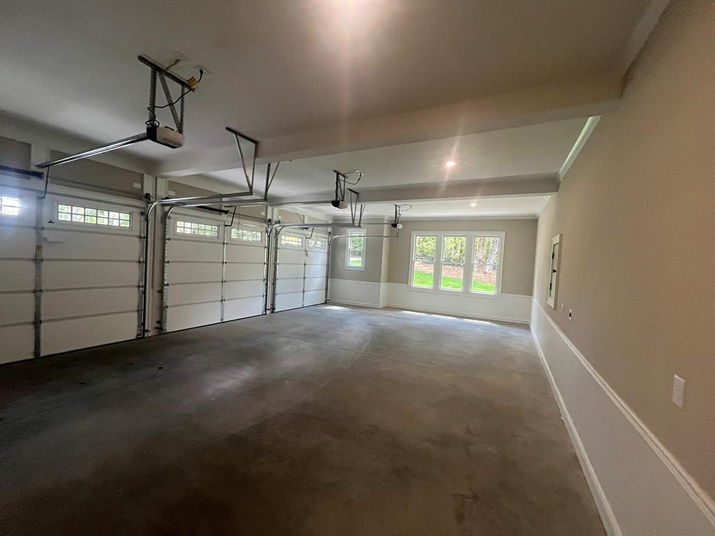 711 Hornage Road Ball Ground, GA 30107 - Photo 23 of 61 a view of empty room with windows