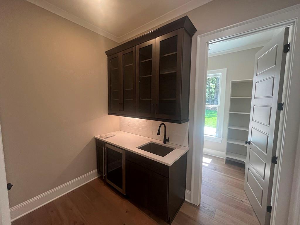 711 Hornage Road Ball Ground, GA 30107 - Photo 7 of 61 a room with storage and utility