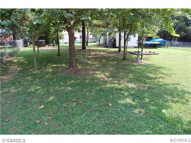 4507 Twelveoaks Road Midlothian, VA 23112 - Photo 5 of 12 Yard/Garden - View of rear yard. Fence on three si
