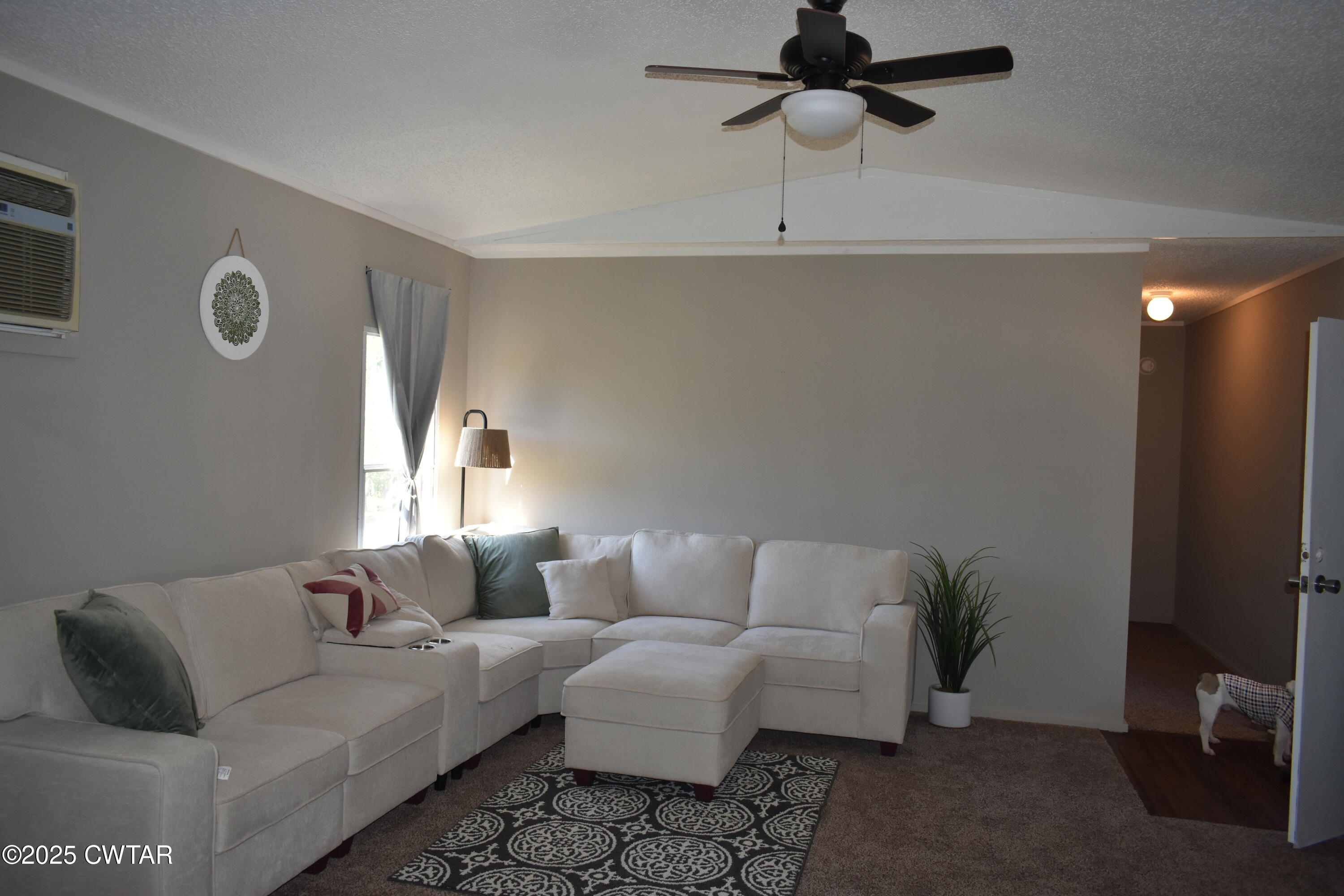 825 Verles King Road Medon, TN 38356 - Photo 41 of 91 a living room with furniture and a flat screen tv