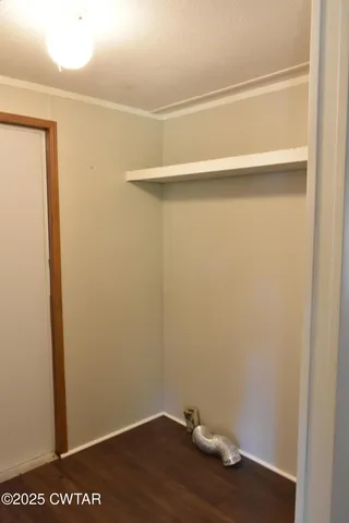 a kitchen with a sink appliances and cabinets