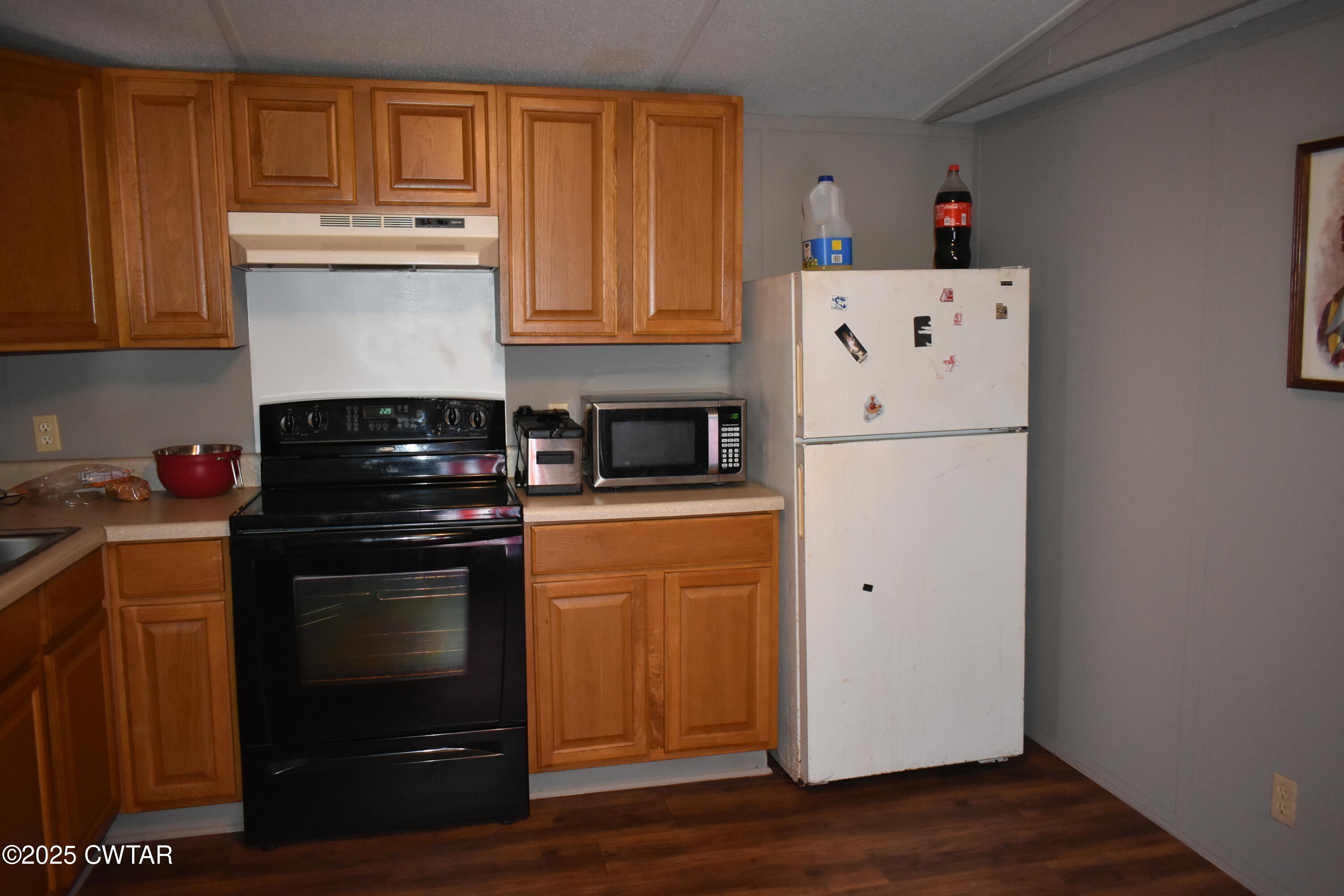 825 Verles King Road Medon, TN 38356 - Photo 81 of 91 a kitchen with refrigerator and cabinets