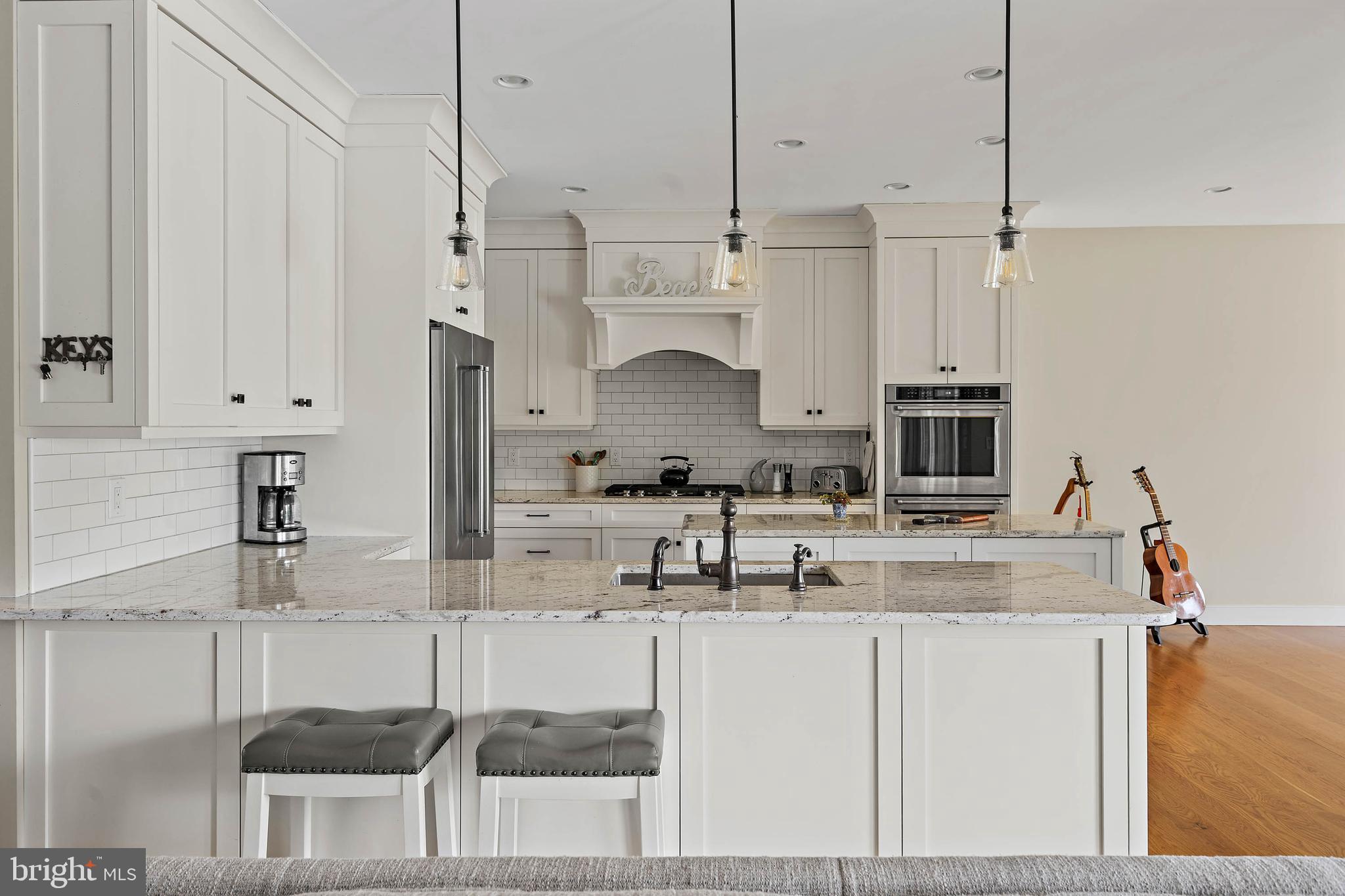 22136 Waterview Road Lewes, DE 19958 - Photo 13 of 89 Kitchen Island w/ Pendant Lighting