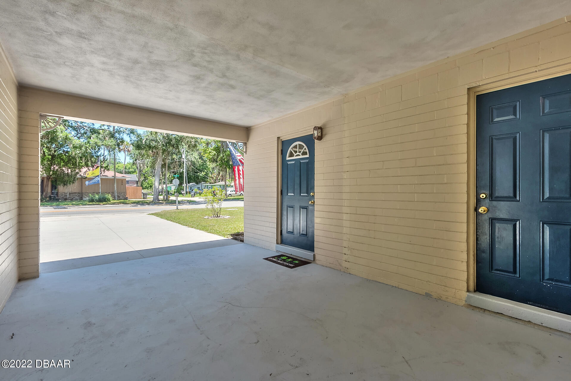 386 Hand Avenue Ormond Beach, FL 32174 - Photo 17 of 27 386-6 carport