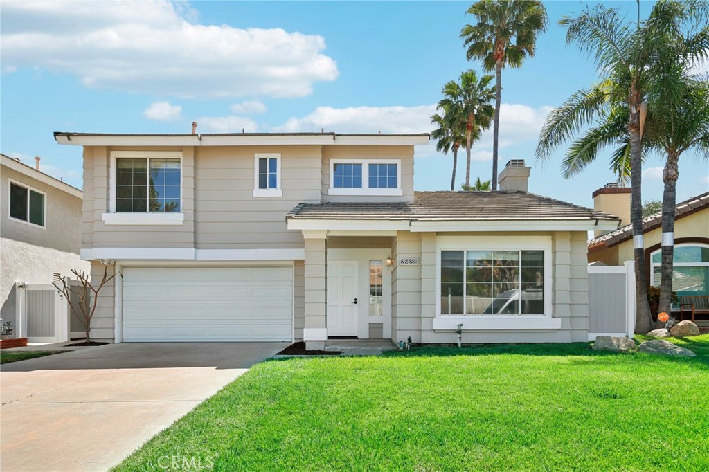 26658 Caravan Circle Corona, CA 92883 - Photo 1 of 50 a view of a yard in front of a house