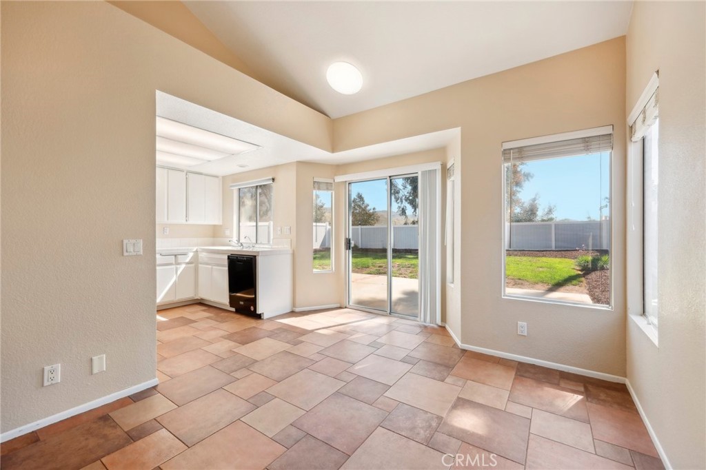 26658 Caravan Circle Corona, CA 92883 - Photo 16 of 50 a view of an entryway with kitchen and livingroom view