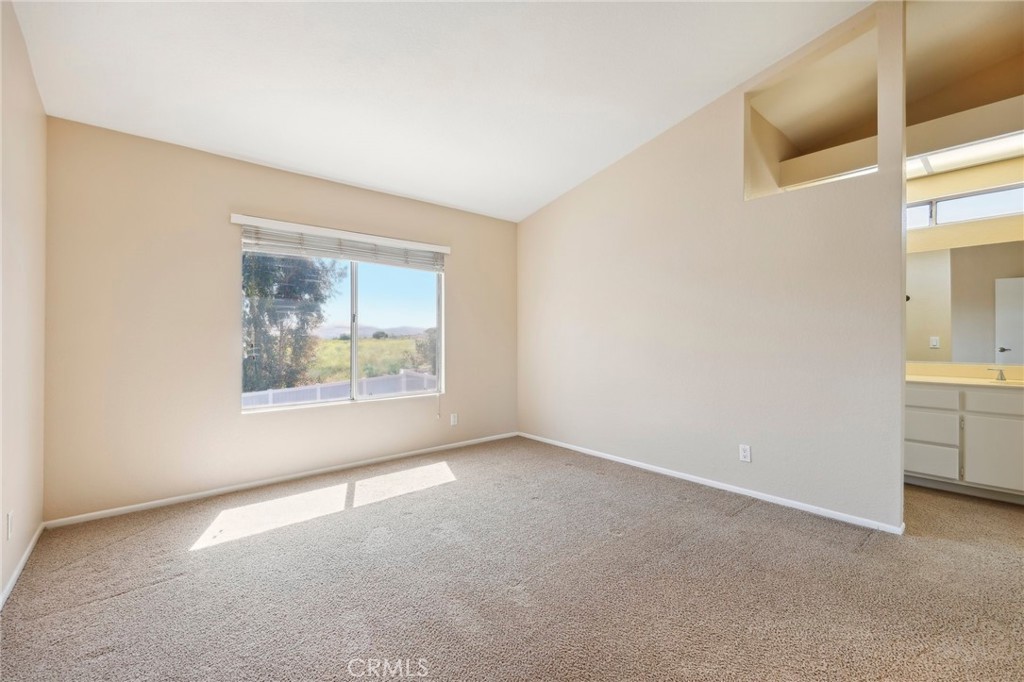 26658 Caravan Circle Corona, CA 92883 - Photo 21 of 50 an empty room with a window
