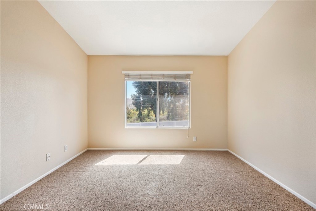 26658 Caravan Circle Corona, CA 92883 - Photo 22 of 50 an empty room with a window