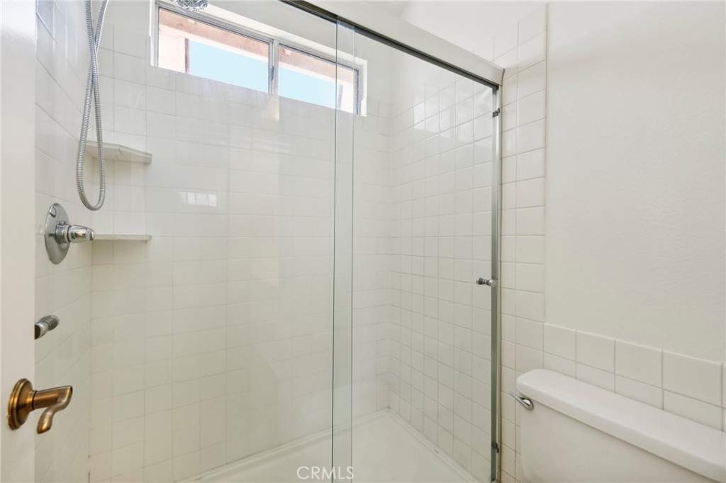 26658 Caravan Circle Corona, CA 92883 - Photo 25 of 50 a bathroom with a shower