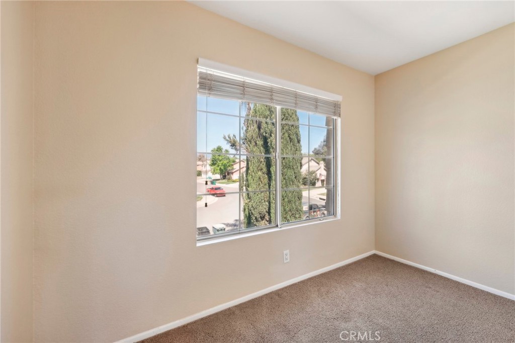 26658 Caravan Circle Corona, CA 92883 - Photo 26 of 50 an empty room with a window