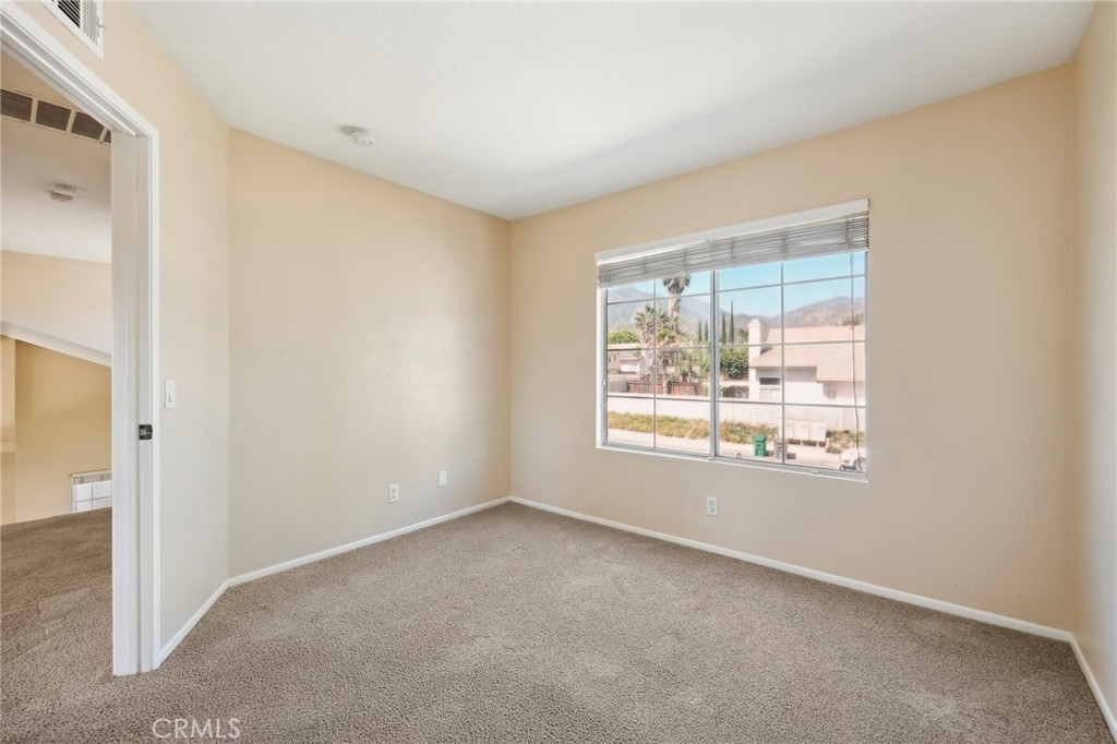26658 Caravan Circle Corona, CA 92883 - Photo 28 of 50 a view of an empty room with a window