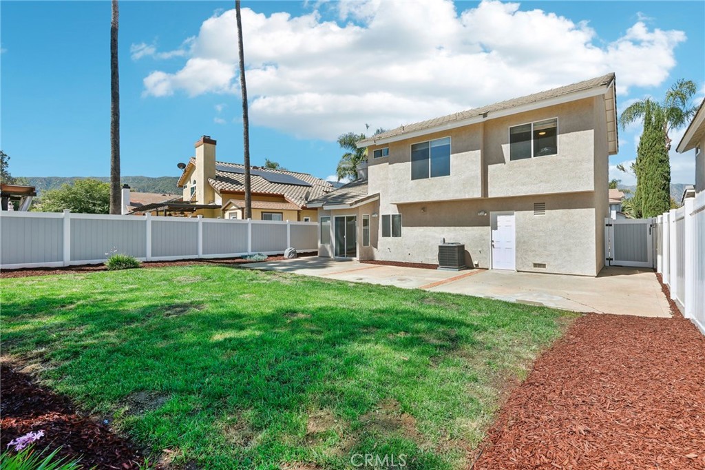 26658 Caravan Circle Corona, CA 92883 - Photo 35 of 50 a house view with a garden space