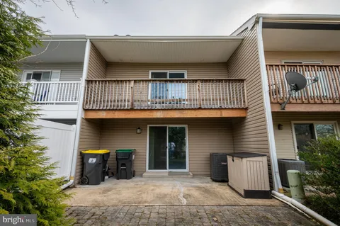 a front view of a house with a garage