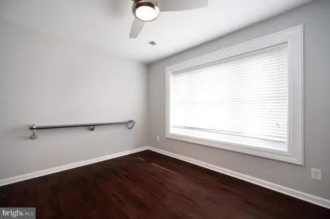 a view of a room that has a window in it