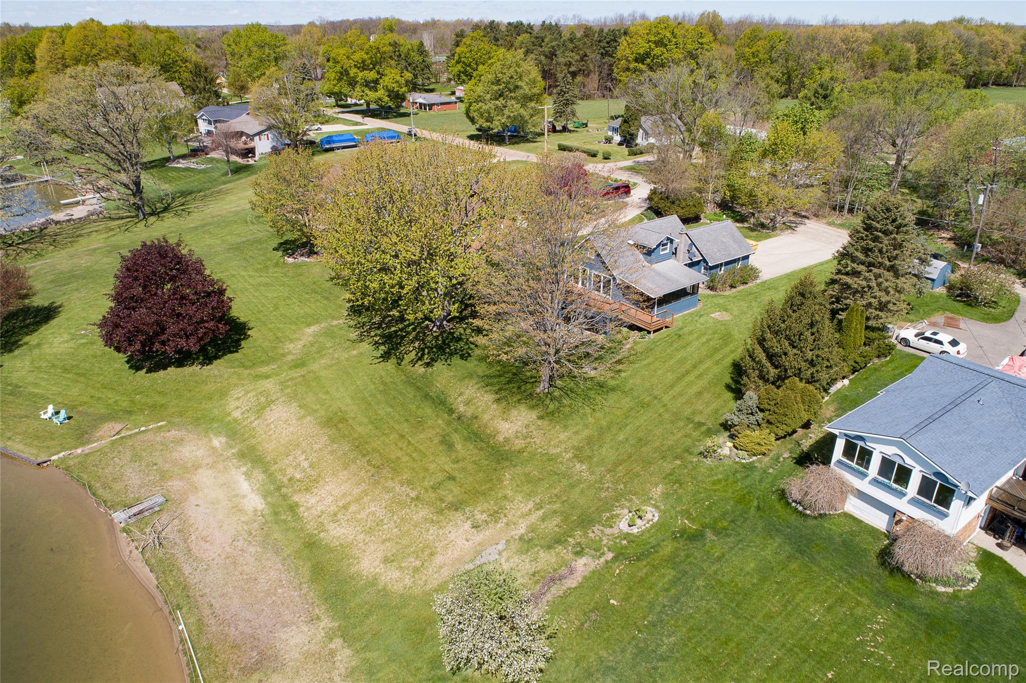 2855 Farmers Creek Road Metamora, MI 48455 - Photo 45 of 51 Expansive property featuring a waterfront setting with a private dock