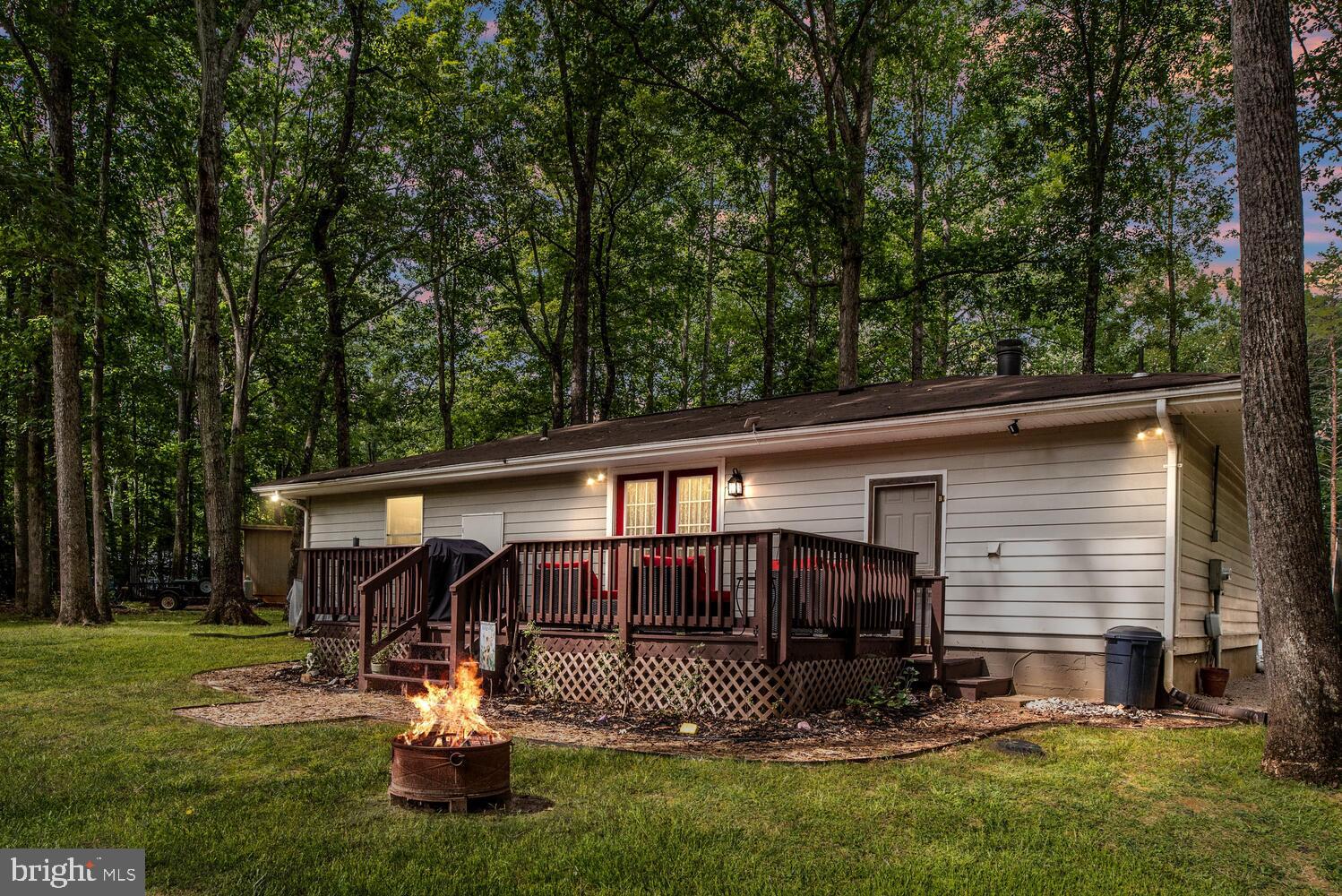 104 Edgemont Lane Locust Grove, VA 22508 - Photo 2 of 48 Entertaining back deck and fire pit.