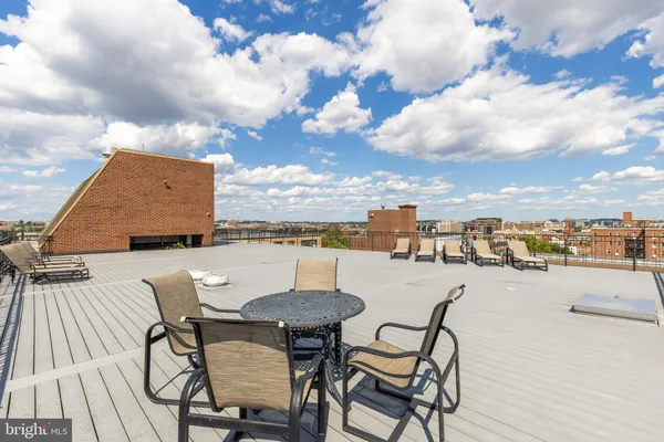 a view of a terrace with seating area
