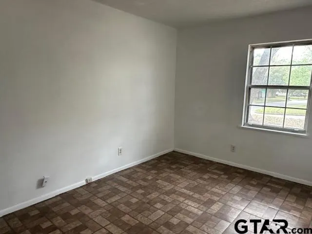 an empty room with a window