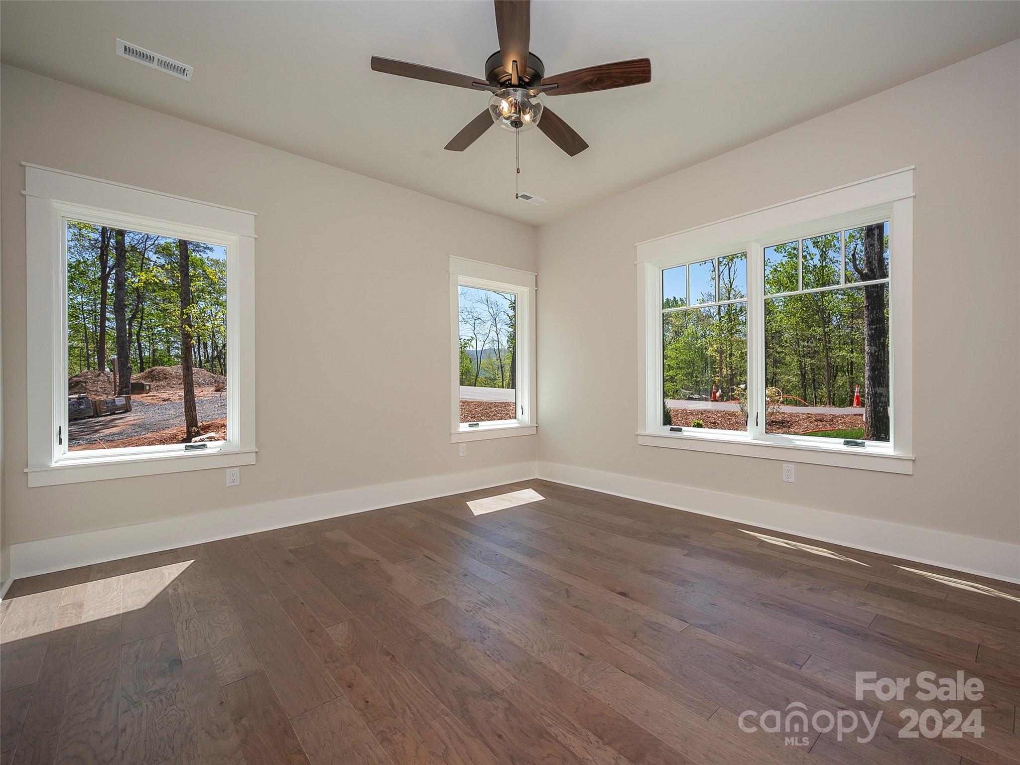 87 Jackson Ridge Ln Mill Spring, Unit 4 Mill Spring, NC 28756 - Photo 11 of 48 a view of an empty room with a window