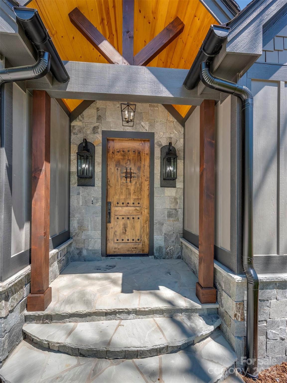87 Jackson Ridge Ln Mill Spring, Unit 4 Mill Spring, NC 28756 - Photo 3 of 48 a view of a entrance door of the house
