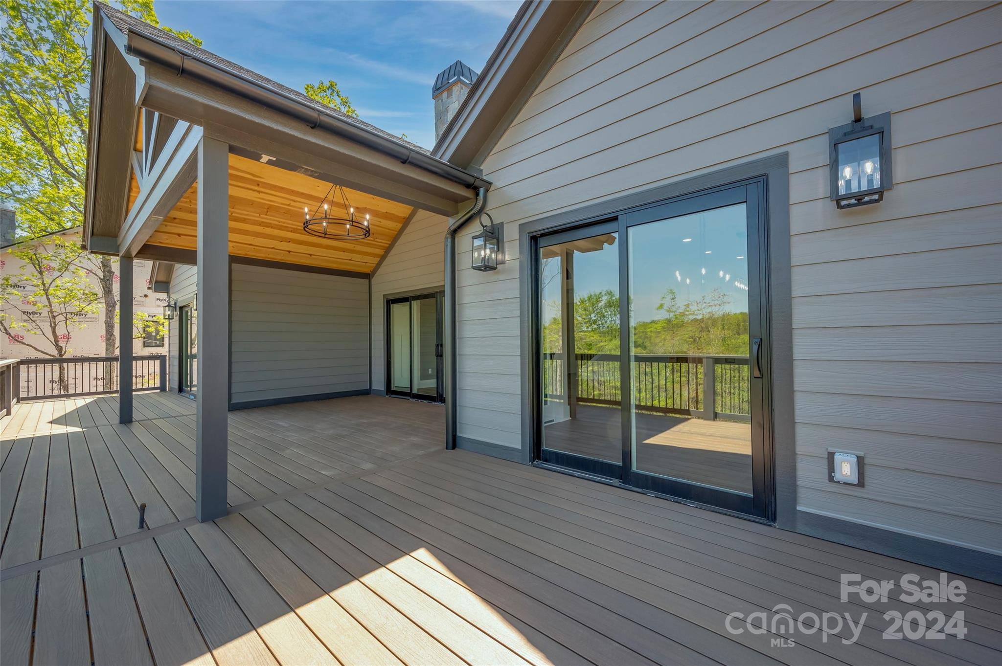 87 Jackson Ridge Ln Mill Spring, Unit 4 Mill Spring, NC 28756 - Photo 36 of 48 a view of livingroom with an entryway and wooden floor