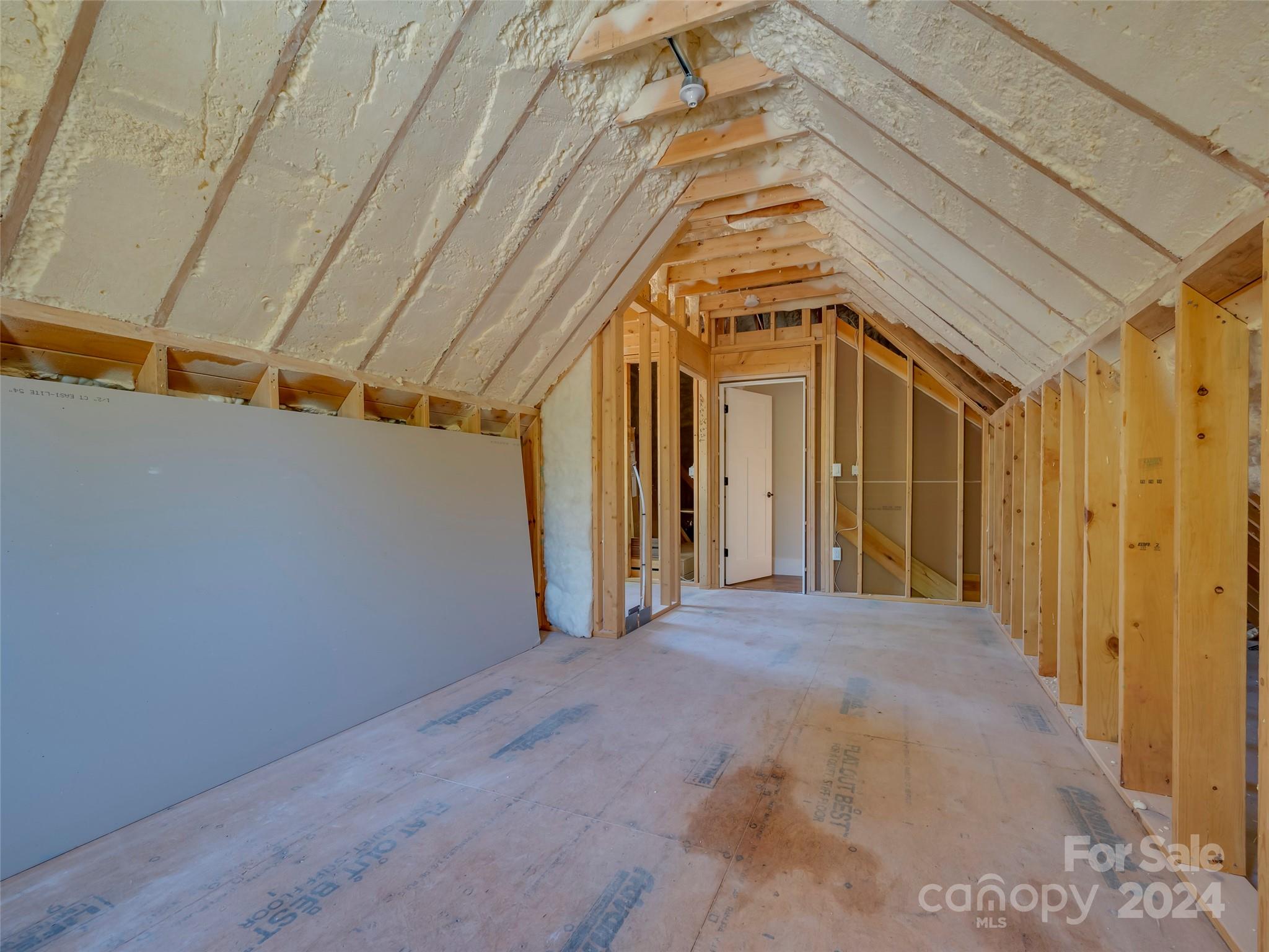 87 Jackson Ridge Ln Mill Spring, Unit 4 Mill Spring, NC 28756 - Photo 39 of 48 a view of a hallway with wooden floor