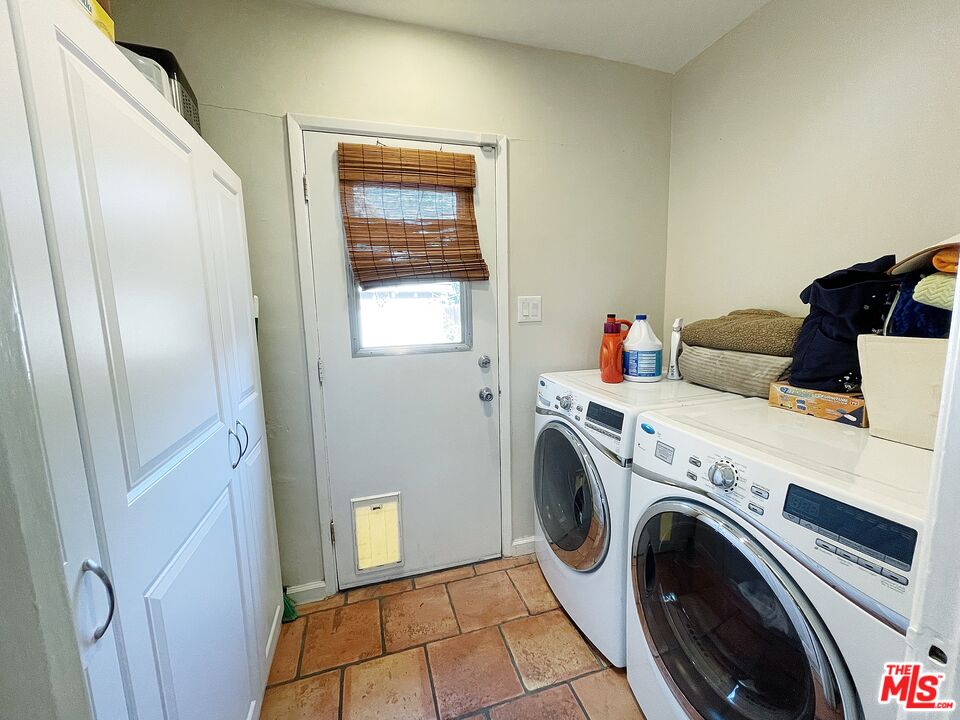 6464 Newcastle Avenue Reseda, CA 91335 - Photo 8 of 17 a view of utility room with washer and dryer