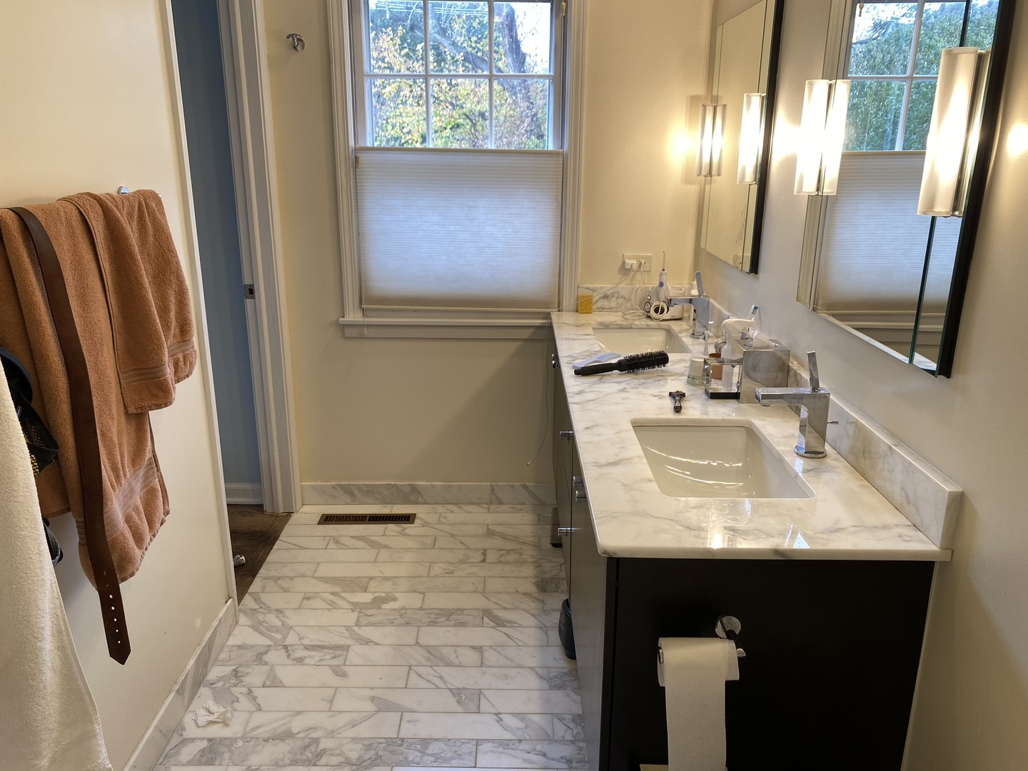 2510 Sheridan Road Evanston, IL 60201 - Photo 11 of 28 a bathroom with a sink a mirror and a shower