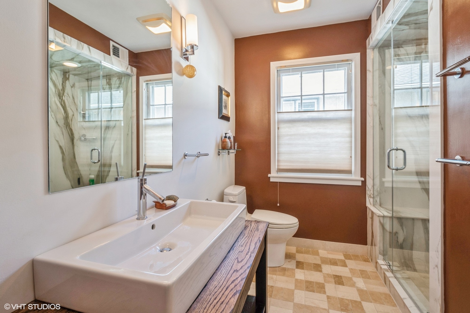 2510 Sheridan Road Evanston, IL 60201 - Photo 16 of 28 a bathroom with a sink and a mirror