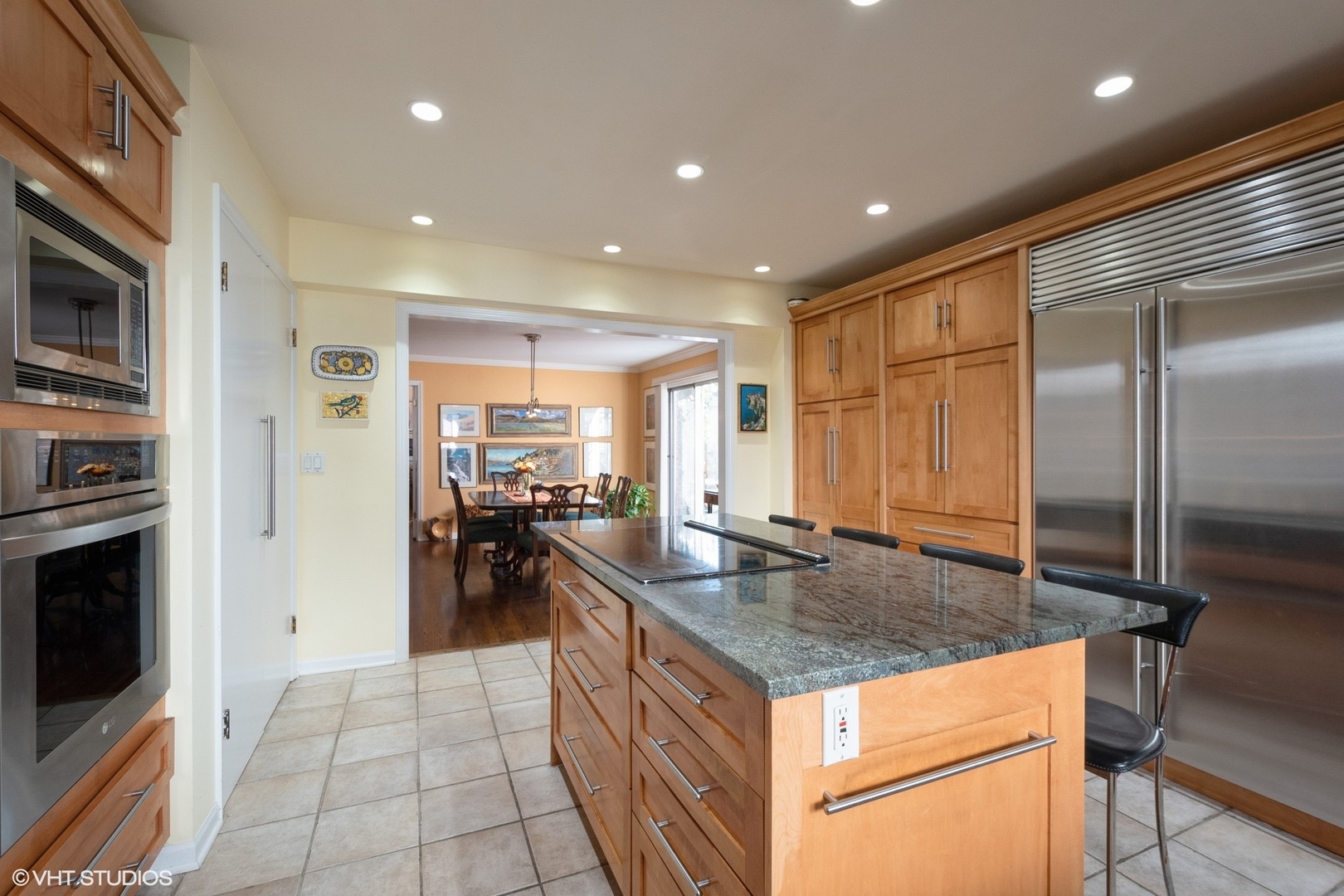 2510 Sheridan Road Evanston, IL 60201 - Photo 5 of 28 a kitchen with stainless steel appliances granite countertop a sink and a refrigerator